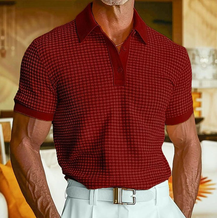 Versatile men's waffle polo shirt, ideal for summer, featuring a comfortable knit and a distinctive textured collar.