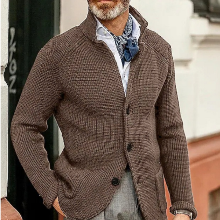 Full-body shot of a men's knitwear button-up cardigan sweater in forest green.