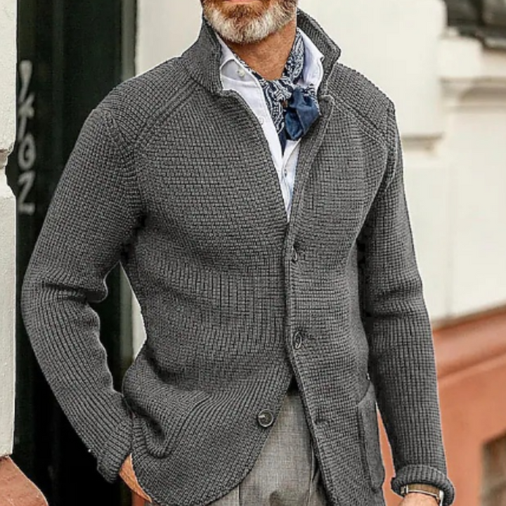 A man in a cozy wear button-up cardigan sweater, ideal for layering in cold weather.