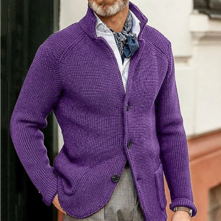 Detailed shot of the buttons on a stylish men's warm cardigan sweater.