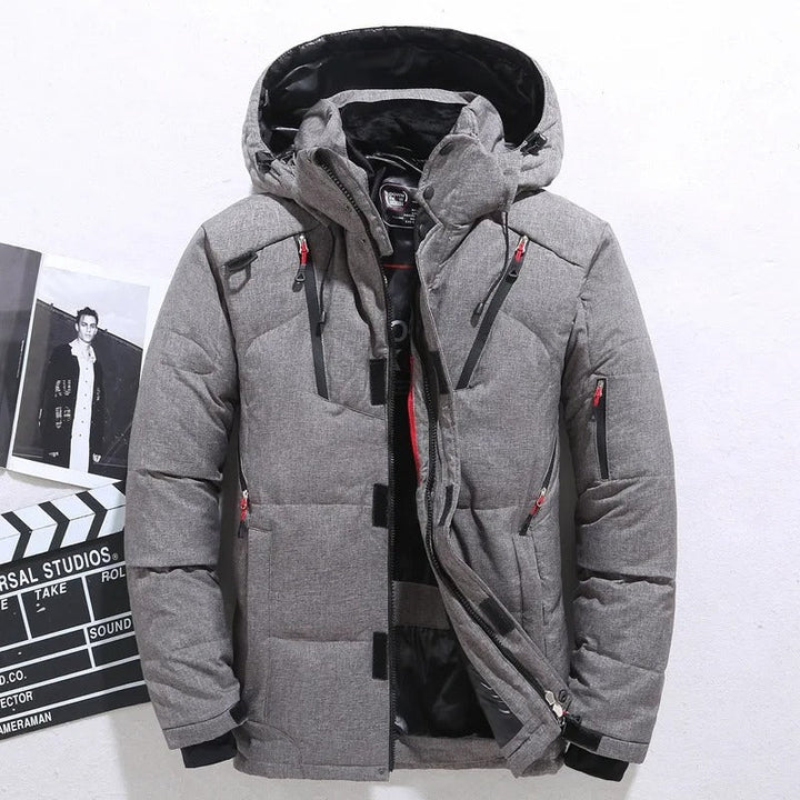 Men's warm hooded puffer winter jacket, insulated for cold weather. Stylish casual outerwear, perfect for winter fashion.