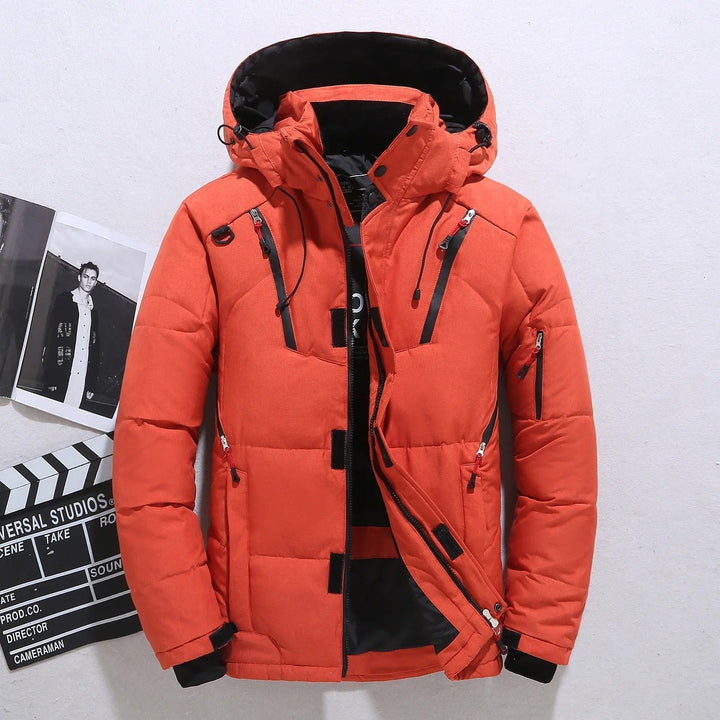 Insulated men's hooded puffer jacket. Warm, lightweight outerwear for cold weather. Essential winter jacket for men.