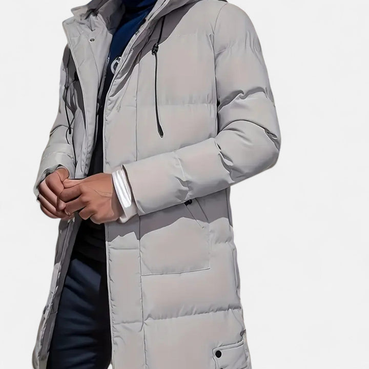 Robust men's hooded winter jacket, designed for ultimate warmth and protection against cold weather.