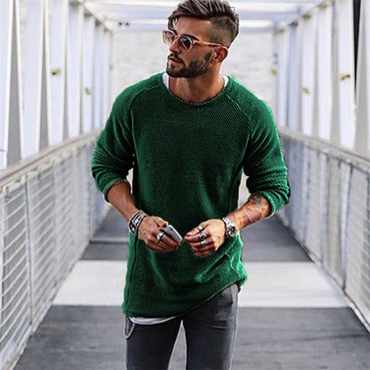 Men's warm knit long sleeve sweater in a stylish crewneck design for winter comfort and everyday wear.