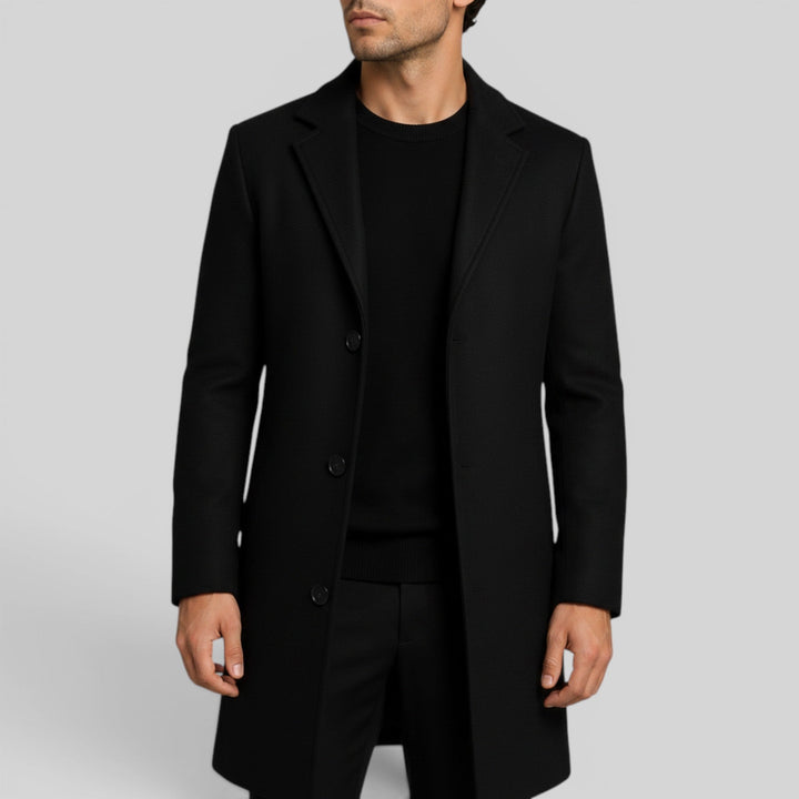 Fashionable men's outerwear: a warm mid-length trench coat with elegant button front.