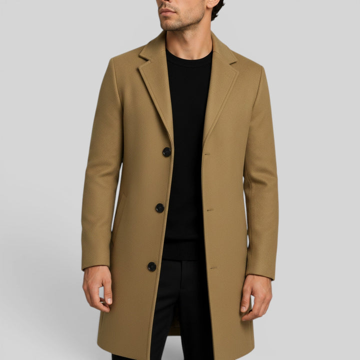Essential men's winter coat: a warm, mid-length trench with classic button front & regular fit.