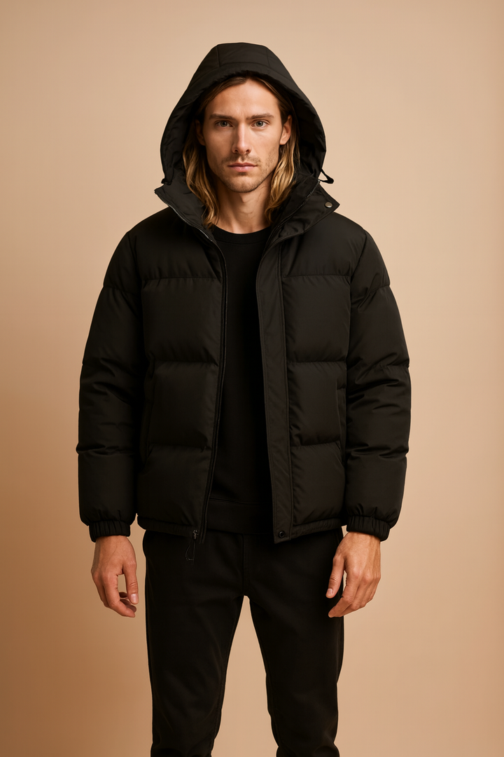 Men's warm quilted winter jacket with hood, ideal for cold weather outdoor activities.