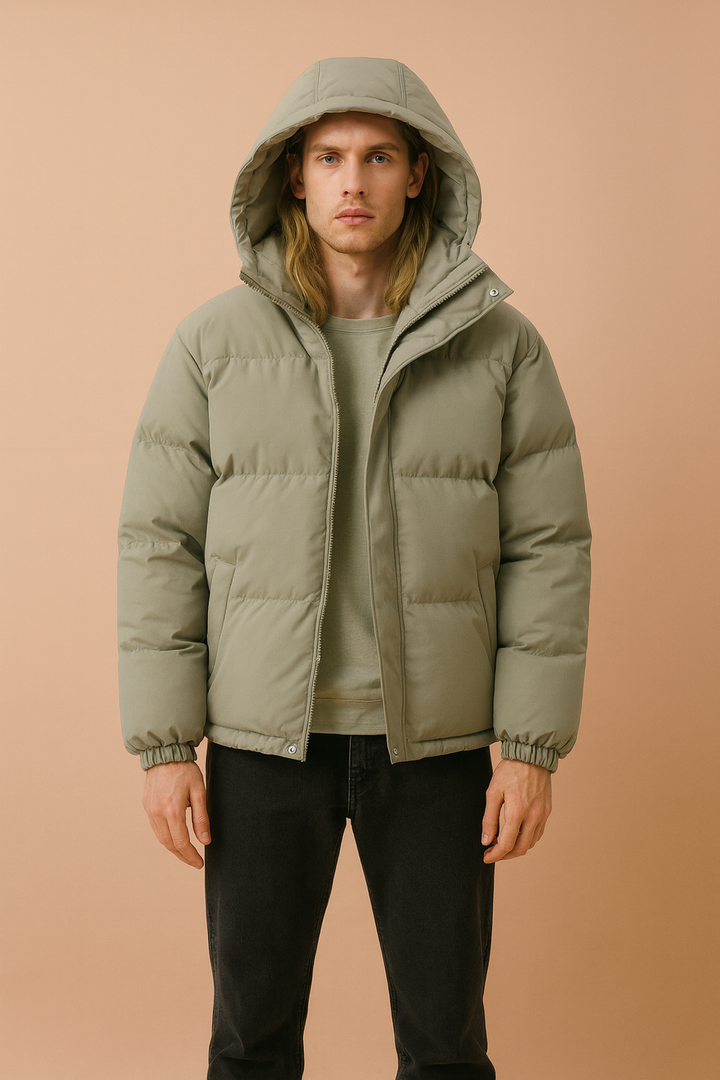Durable men's quilted winter jacket with a cozy hood, offering warmth & protection from cold.