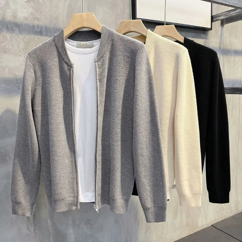 Full-body shot of a man wearing a warm and stylish men's zipper cardigan for a fall/winter casual look.