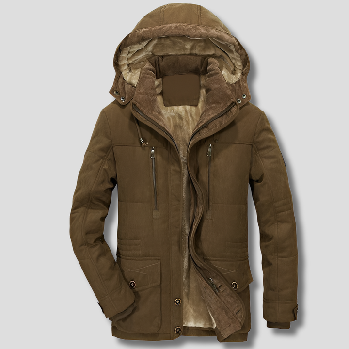 Close-up of a men's insulated winter jacket, highlighting its waterproof fabric and warm lining for extreme cold.
