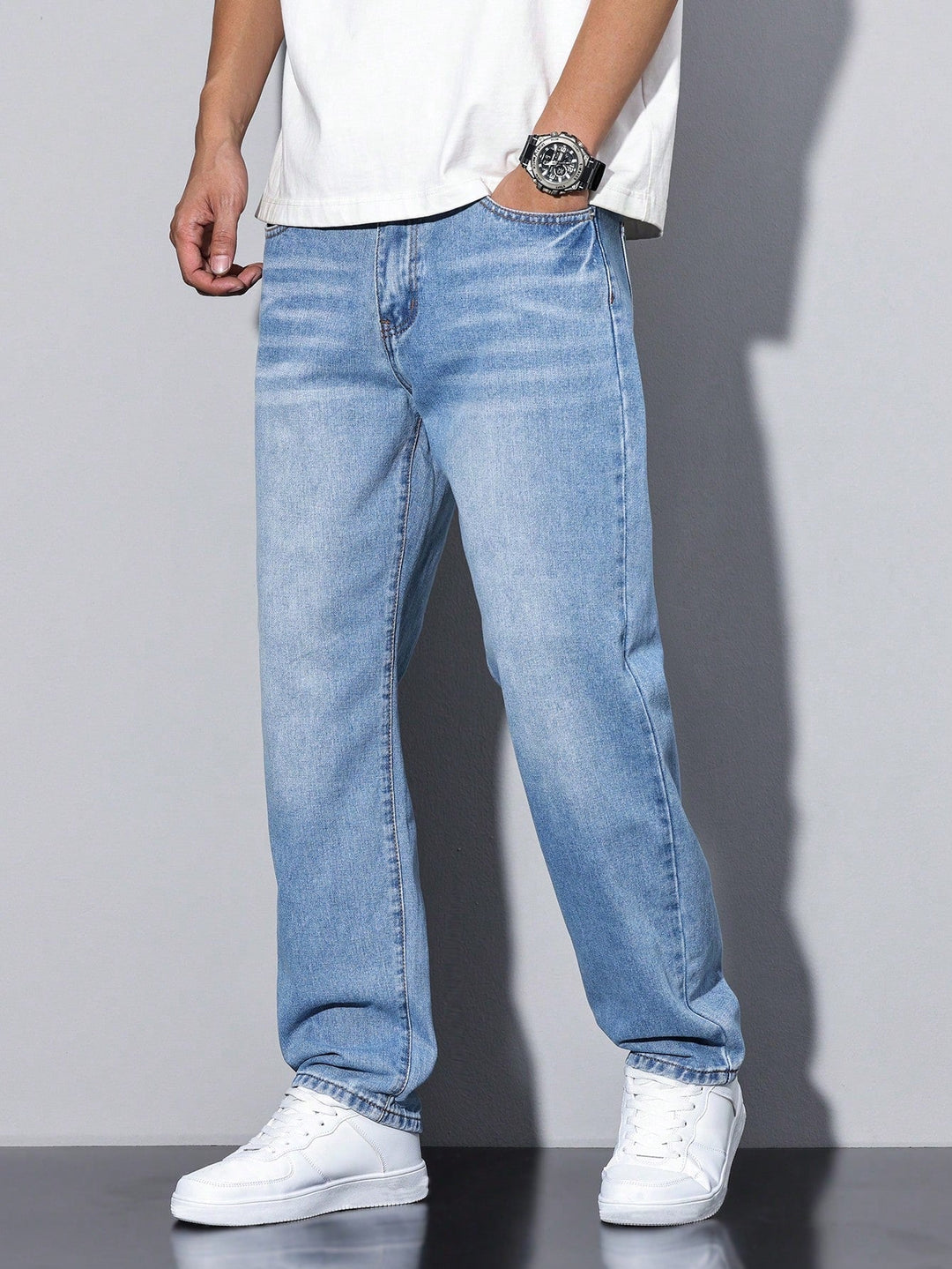 Loose fit men's washed straight leg pants for relaxed and stylish everyday wear.