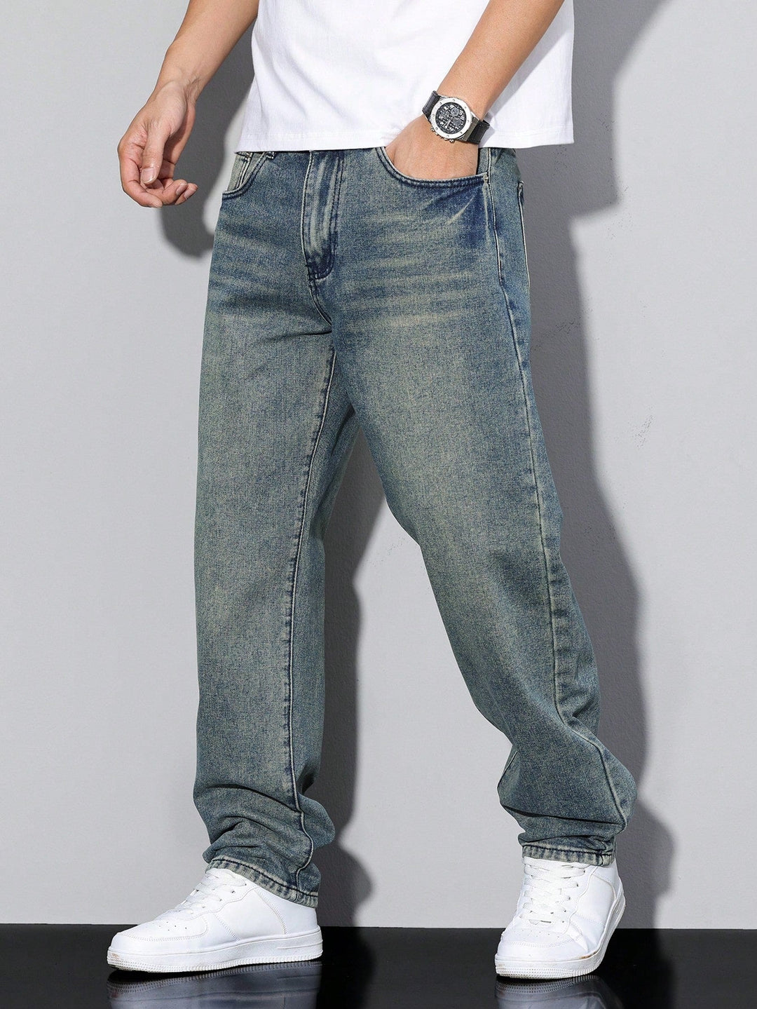 Modern men's straight leg pants, casual washed finish, for versatile styling.