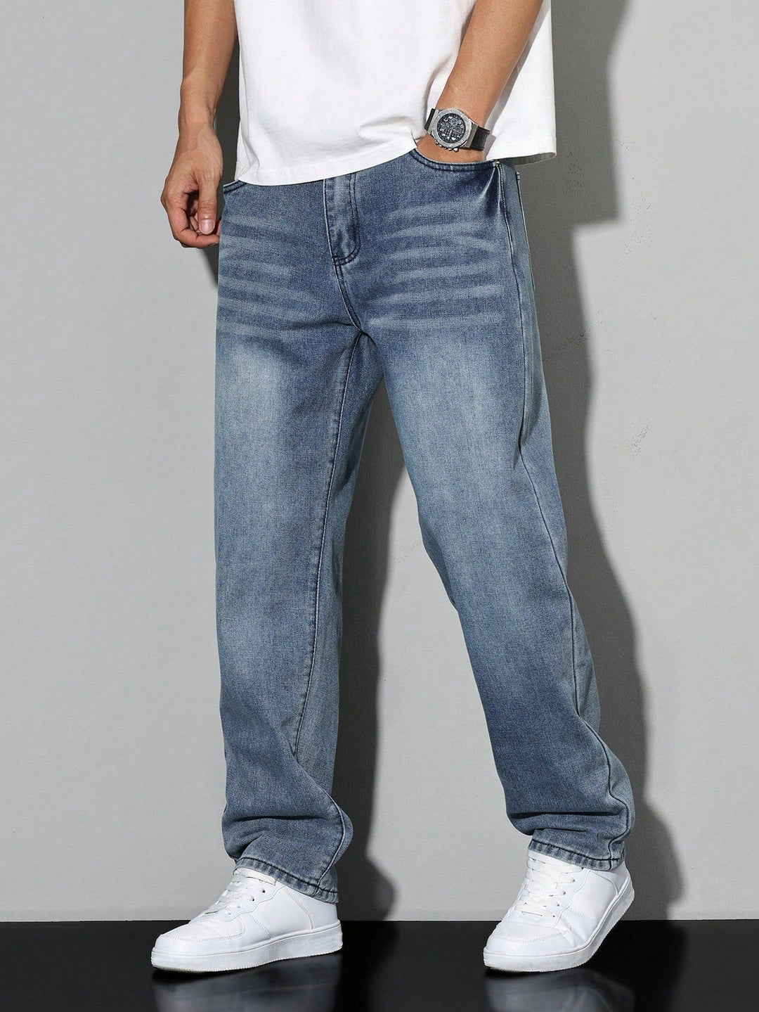 Comfortable straight leg pants for men, features a trendy washed aesthetic.