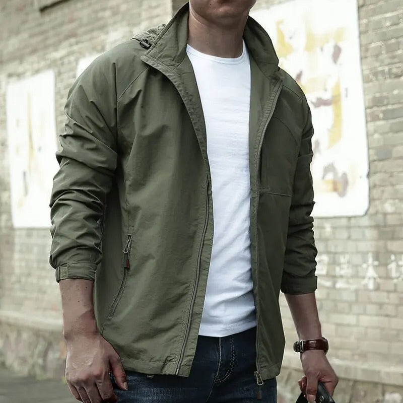 Close-up of men's waterproof breathable cargo jacket pocket detail, perfect for summer outdoor and utility wear.