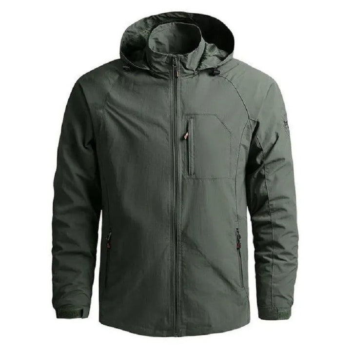 Man wearing a modern waterproof breathable cargo summer jacket, suitable for hiking, travel, or everyday casual use.