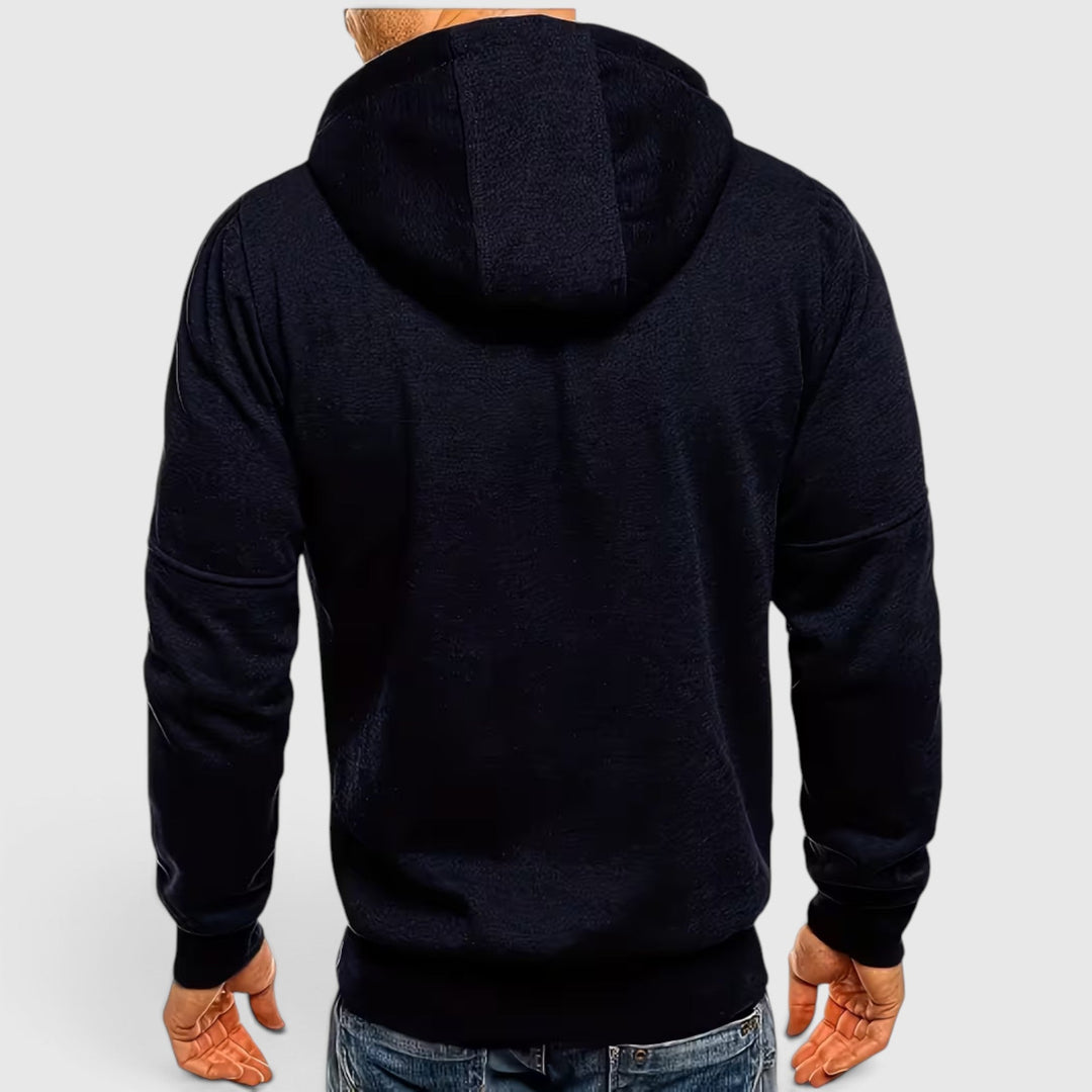 Men's winter outfit: a waterproof, loose-fit, zip-up hoodie with hood, offering warmth.