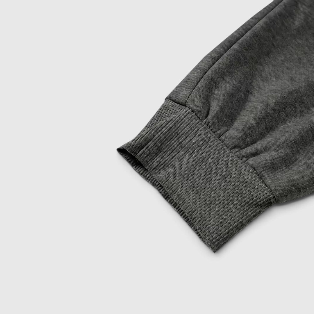 Men's everyday waterproof hoodie. Loose-fit zip-up, hooded, for casual style & protection.