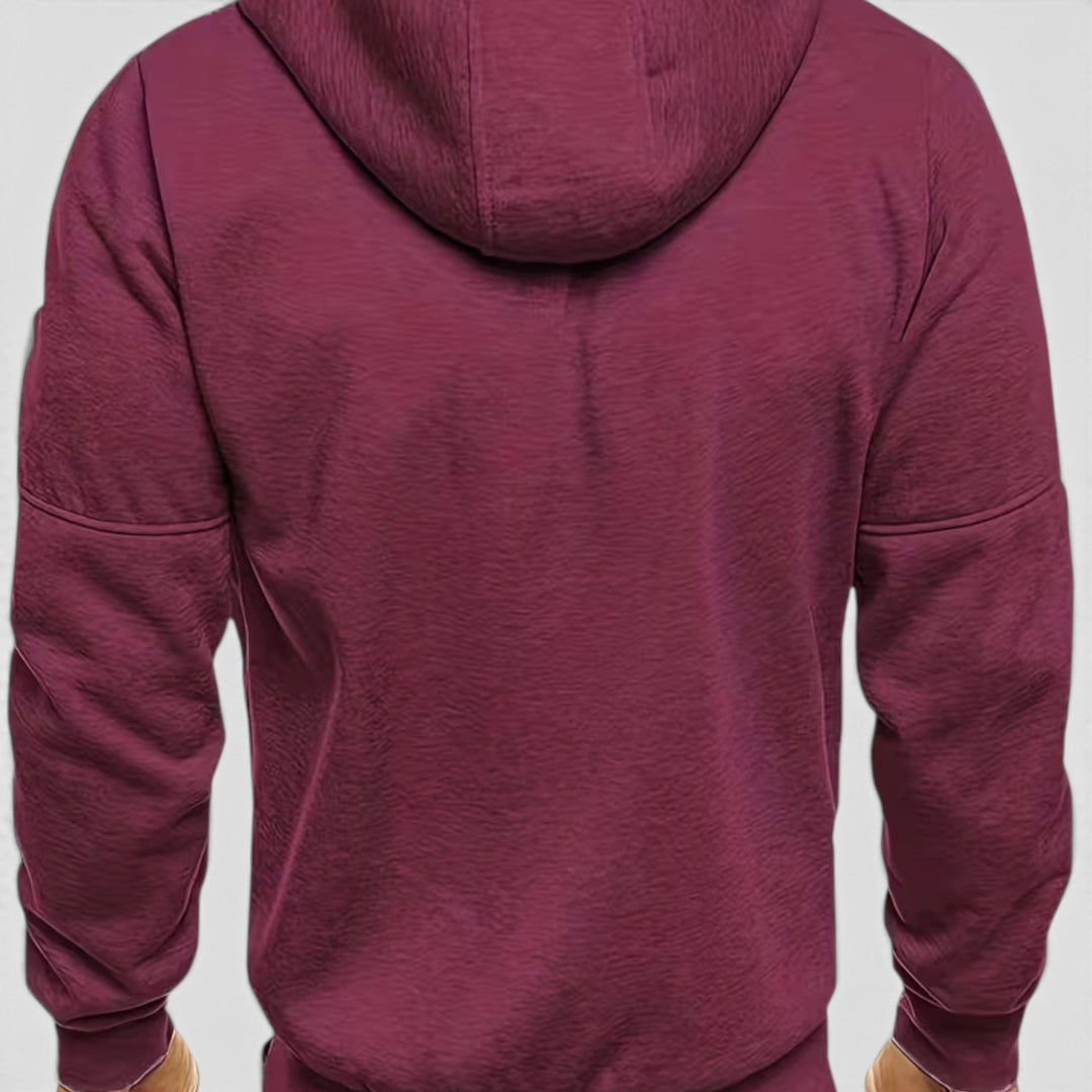All-weather men's loose-fit waterproof zip-up hoodie. Comfortable outerwear for fall/winter.