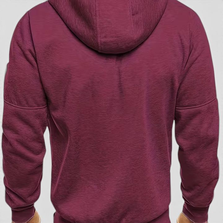 All-weather men's loose-fit waterproof zip-up hoodie. Comfortable outerwear for fall/winter.