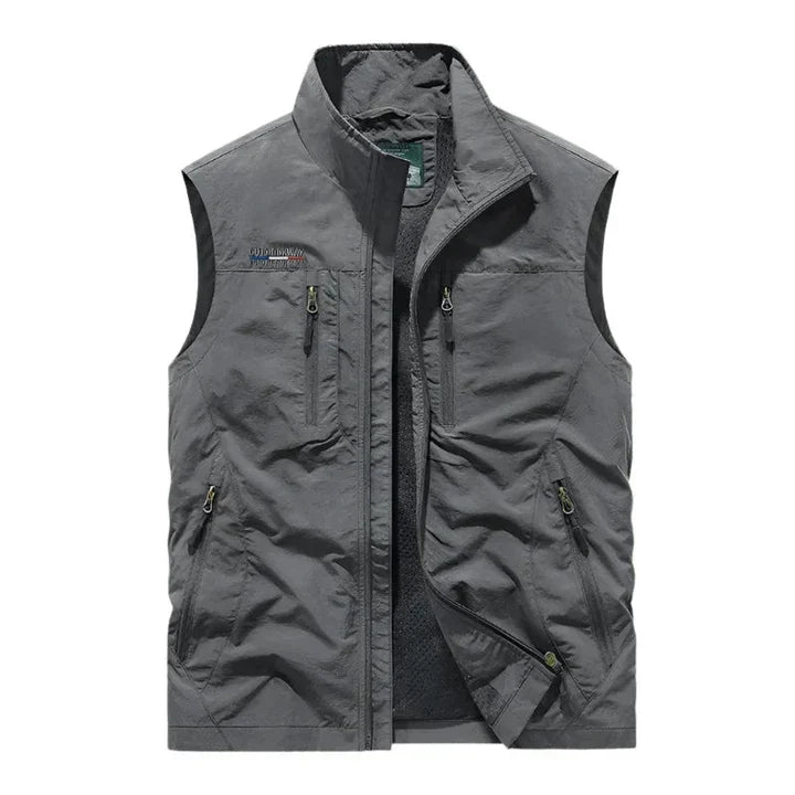 Warm insulated bodywarmer for men, a sleeveless jacket designed for winter layering & cold weather.