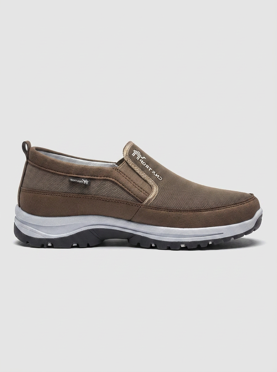 Comfortable men's orthopedic slip-on shoes with waterproof protection. Supportive design for all-day wear.