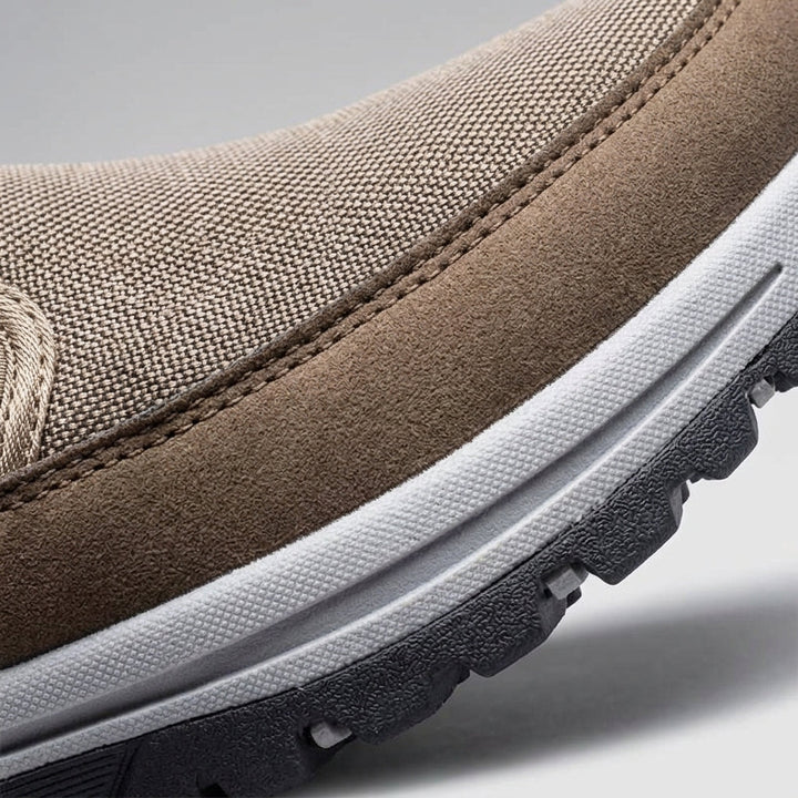 Easy-wear men's slip-on sneakers, waterproof & orthopedic for casual all-season comfort and support.