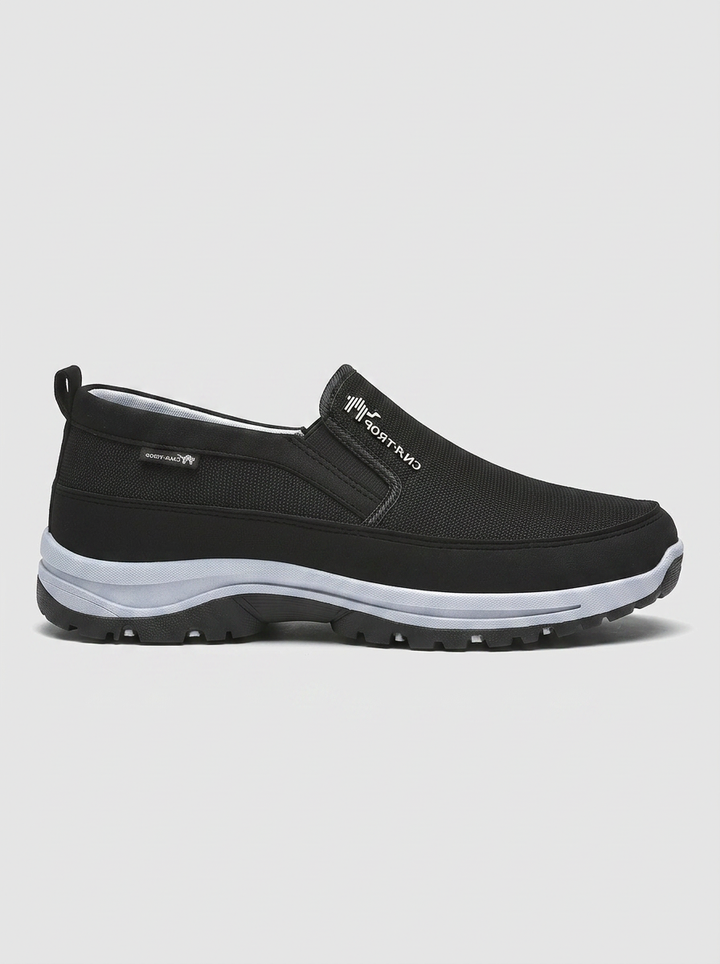 Supportive men's orthopedic slip-on shoes, waterproof for comfort. Casual easy-wear design.