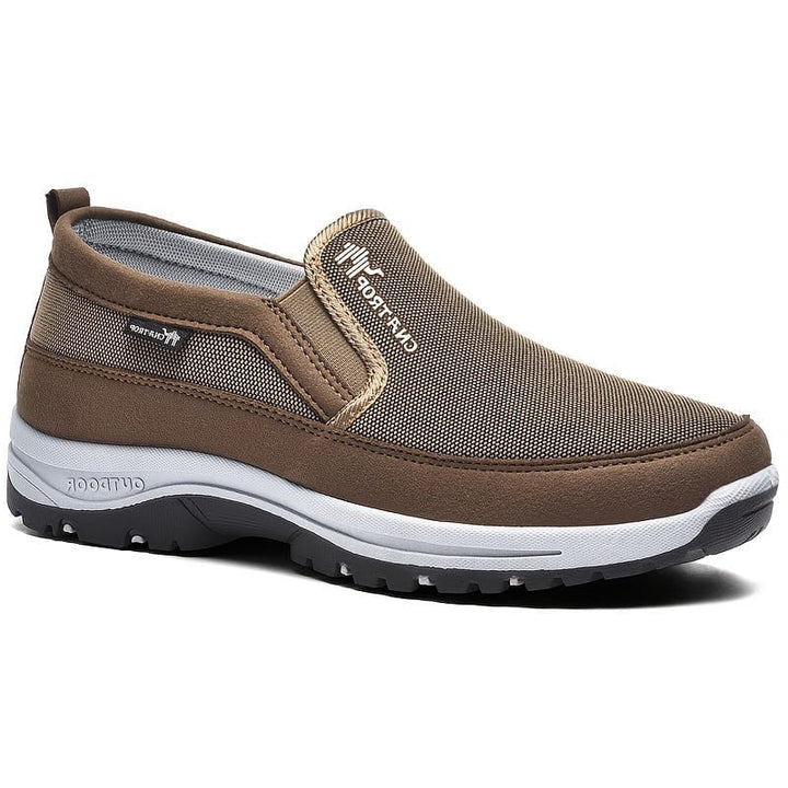 Stylish men's waterproof slip-on sneakers offering orthopedic comfort & support for casual outings.