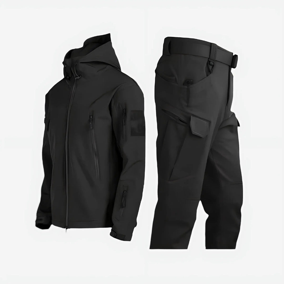 Men's waterproof thermal insulated jacket and trousers set for outdoor winter hiking and mountaineering adventures.
