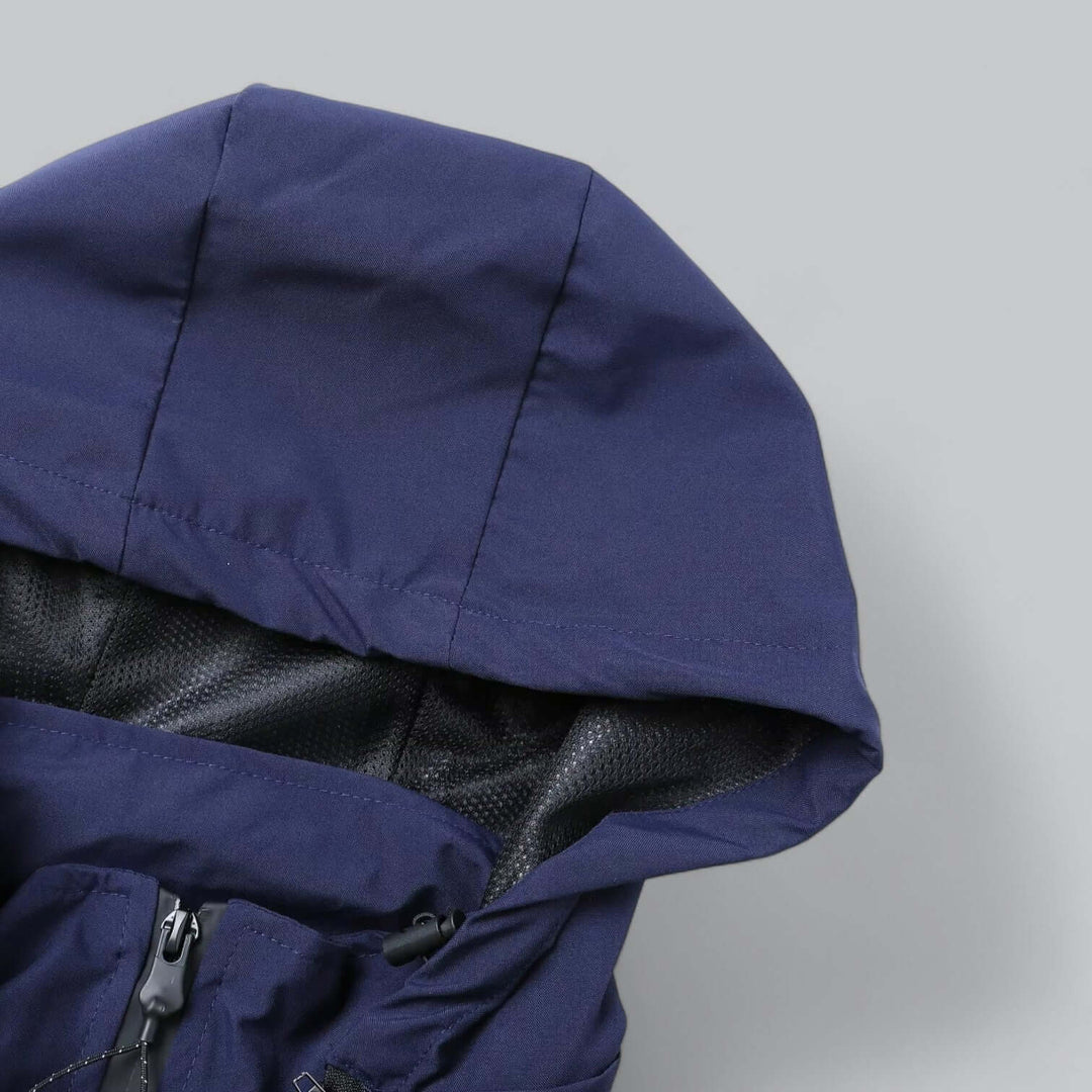 Grey men's windproof jacket, waterproof & durable. Features a detachable hood, ideal for activewear.