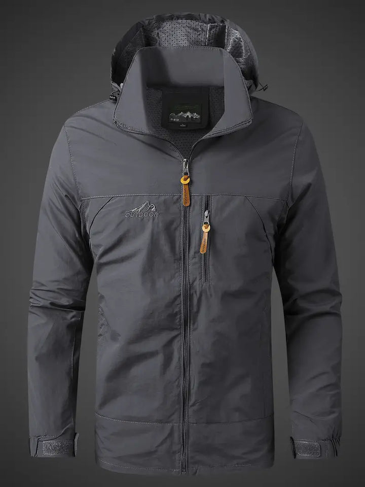 High-performance men's waterproof outdoor jacket with hood, windproof for active rainy adventures.