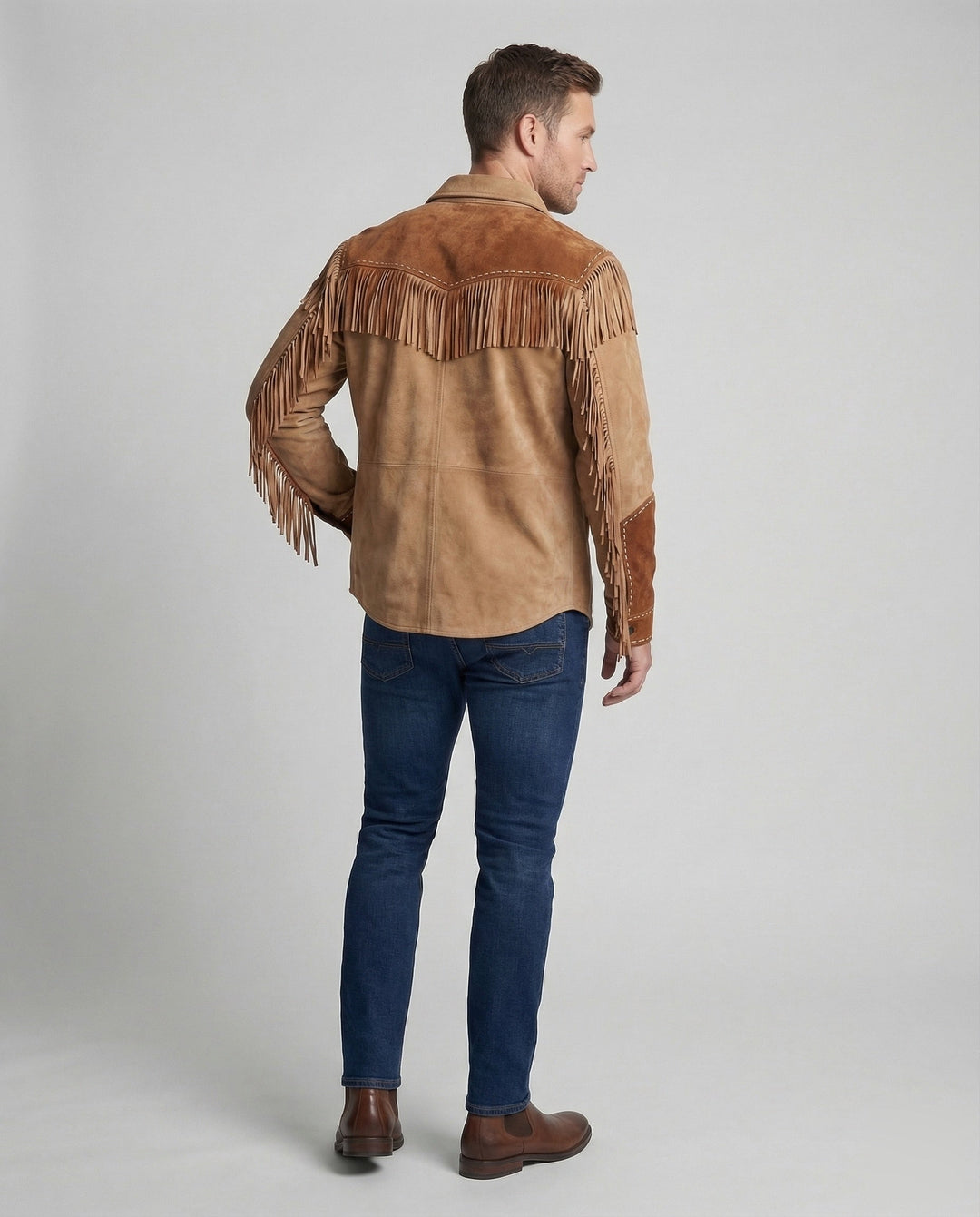 Festival wear: men's embroidered shirt with eye-catching fringe.