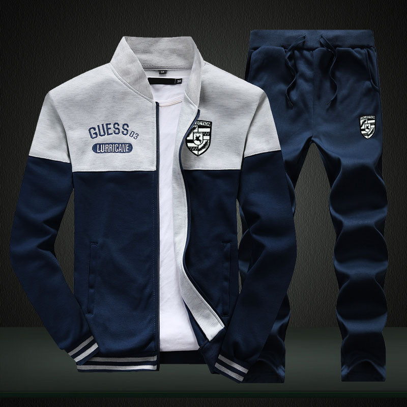 Close-up of a men's baseball-inspired tracksuit in white and blue, perfect for sports or loungewear.