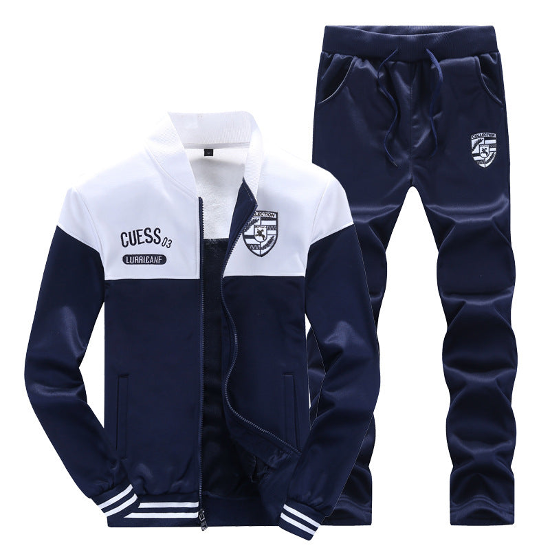 Dynamic men's white and blue tracksuit, a new sporty set blending athletic function with casual appeal.