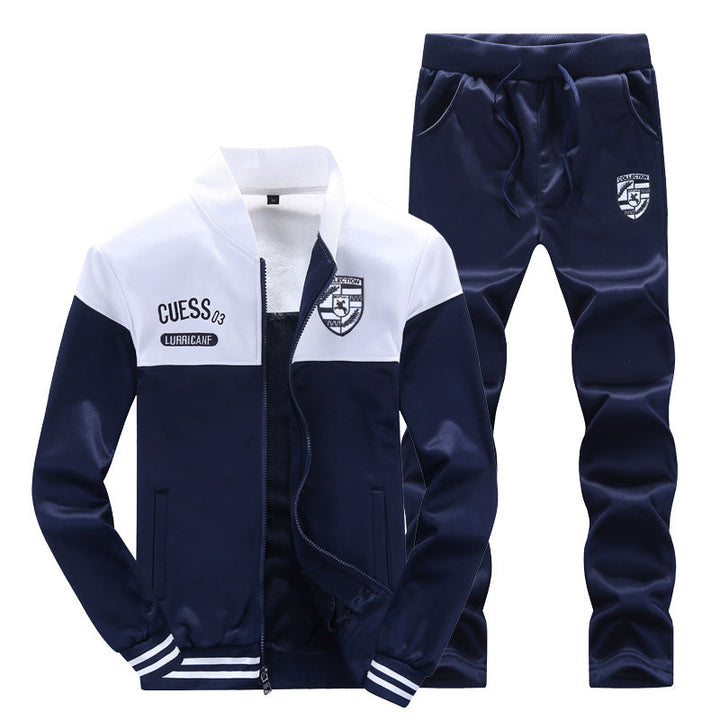 Dynamic men's white and blue tracksuit, a new sporty set blending athletic function with casual appeal.