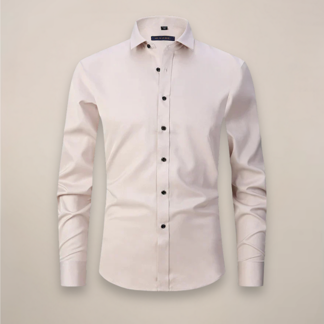 Detailed fabric texture of a white men's structured fit wrinkle-free long-sleeve dress shirt.