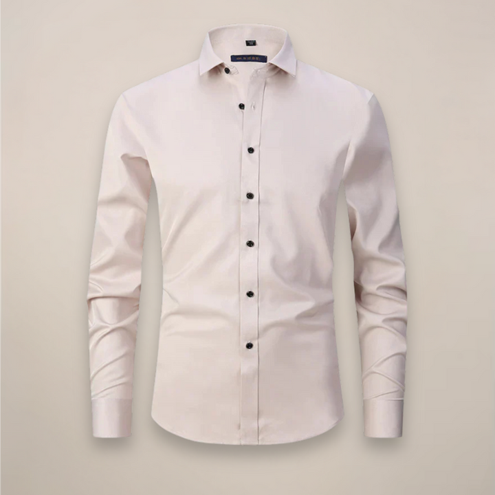Detailed fabric texture of a white men's structured fit wrinkle-free long-sleeve dress shirt.