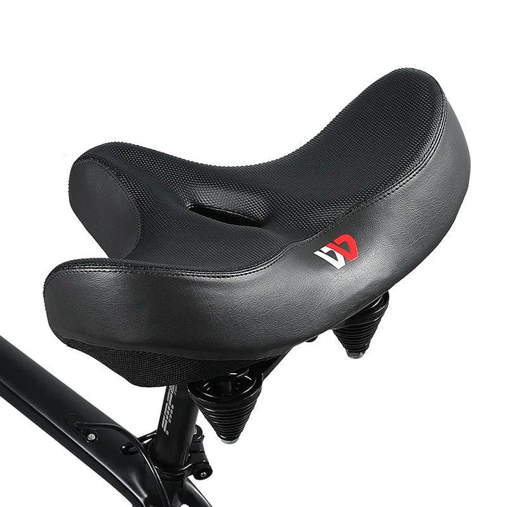 Plush, wide men's bike seat for ultimate comfort. Features shock-absorbing tech, ideal for long-distance cycling.