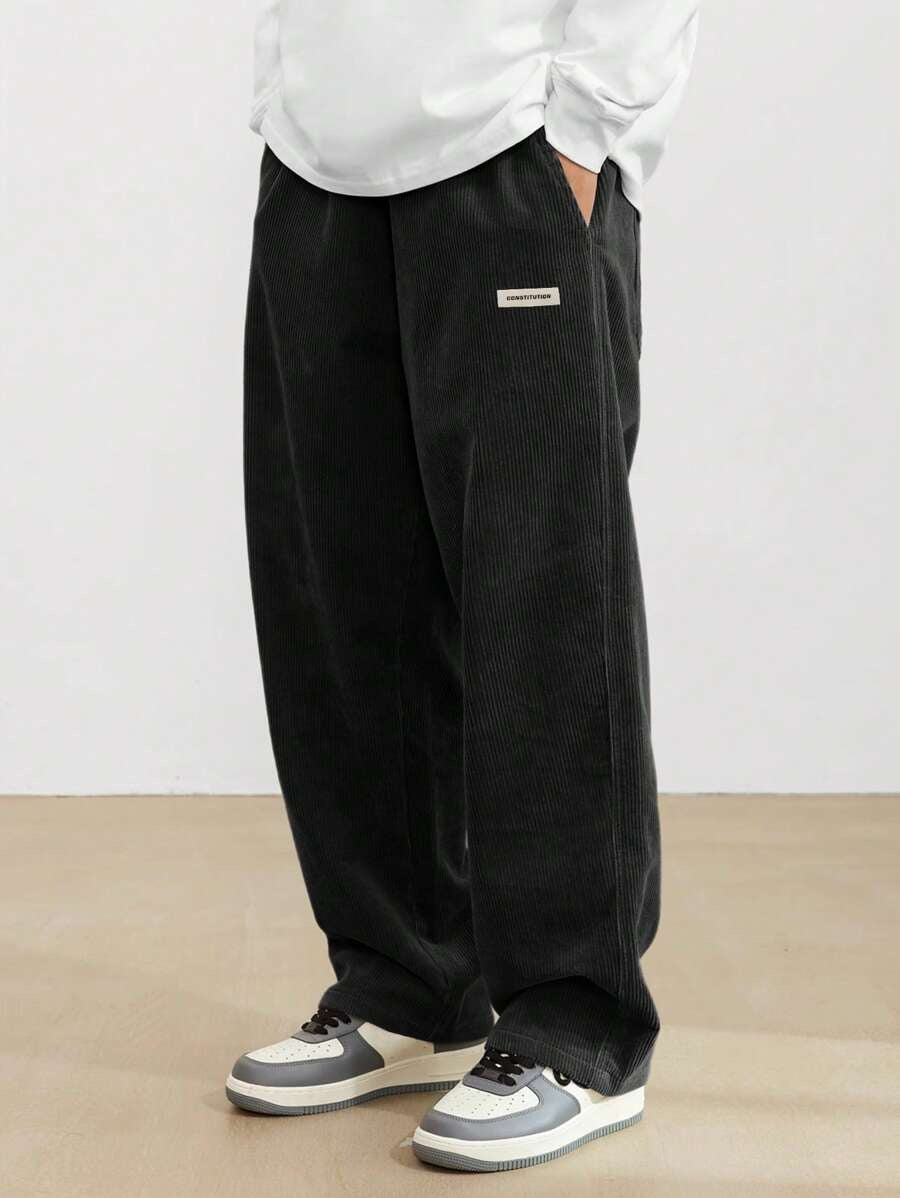 Comfortable men's wide leg trousers with a relaxed fit, ideal for everyday effortless style. Versatile casual bottoms.