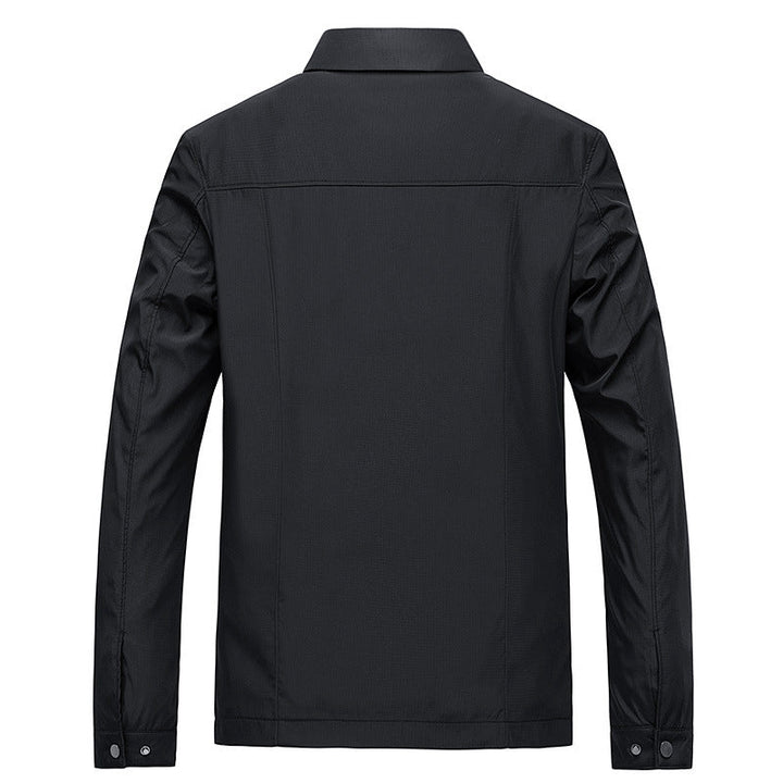 Durable men's windproof outerwear with convenient zip closure & a chic checked lining. Great for outdoor activities.