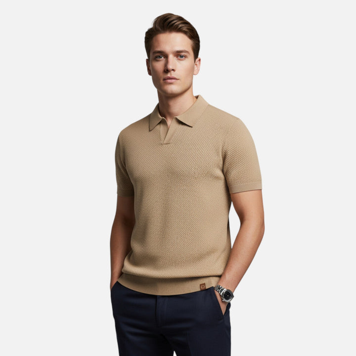 Close-up of the breathable fabric on this short sleeve men's wool polo shirt.