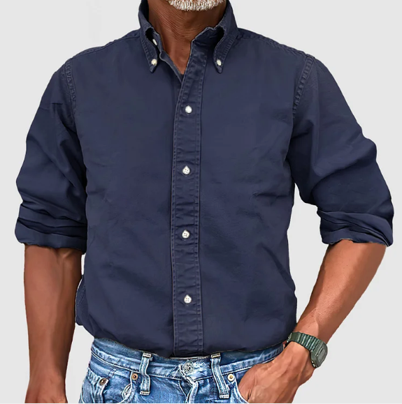 Stay sharp with this men's wrinkle-resistant long-sleeve dress shirt. Perfect for busy office days.