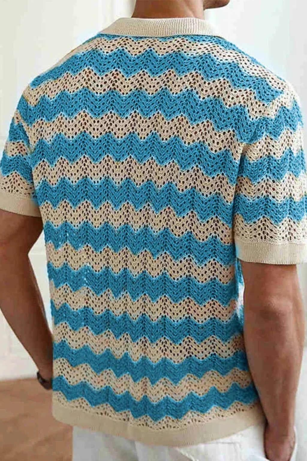 Menswear statement piece: A vibrant zigzag crochet knit polo shirt for everyday wear.