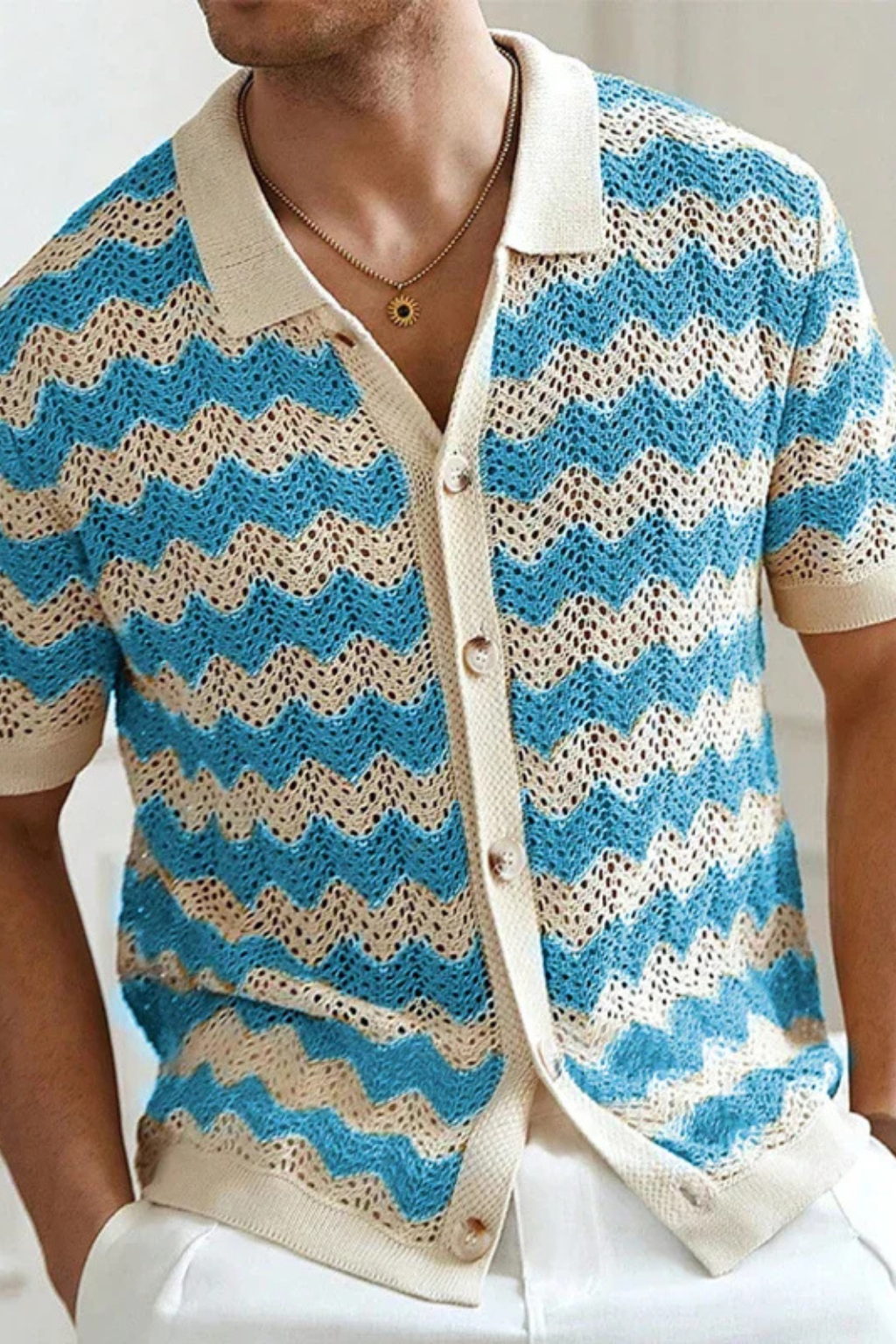 Short sleeve knit polo shirt for men, showcasing a classic button front and zigzag pattern.