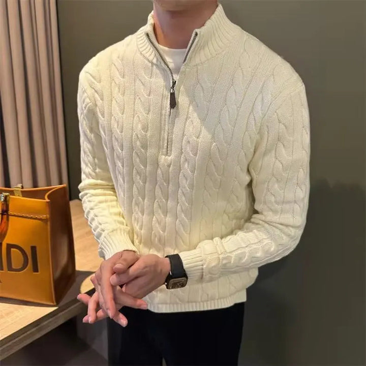 Warm men's cable knit zip-up sweater, ideal for autumn and winter layers, offering classic style.