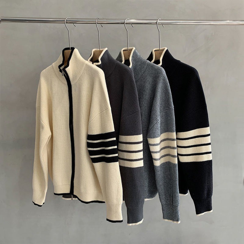 Casual men's zip-up sweater with bold striped sleeves, perfect for a contemporary comfort fit.