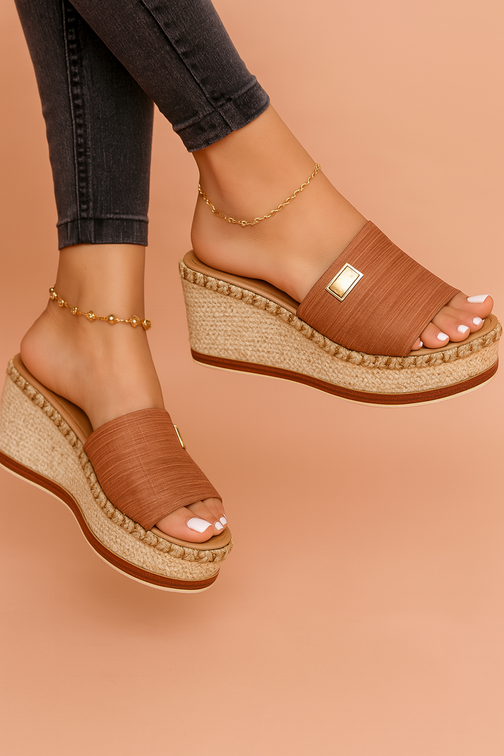 Comfortable Millie women's sandals with woven wedge heel, chic summer style.