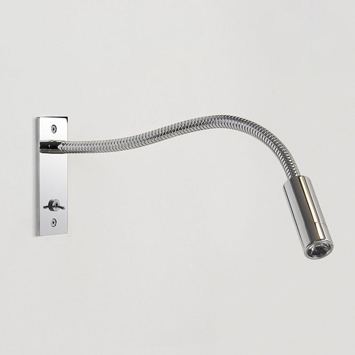 Indoor reading wall lamp with adjustable LED spotlight, minimalist design for cozy spaces.