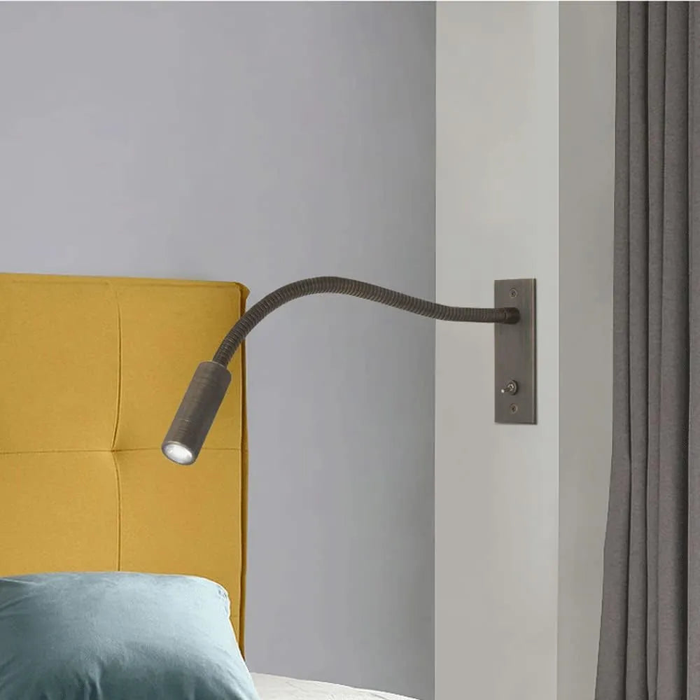 Minimalist adjustable LED wall lamp, spotlight for reading and modern indoor lighting solutions.