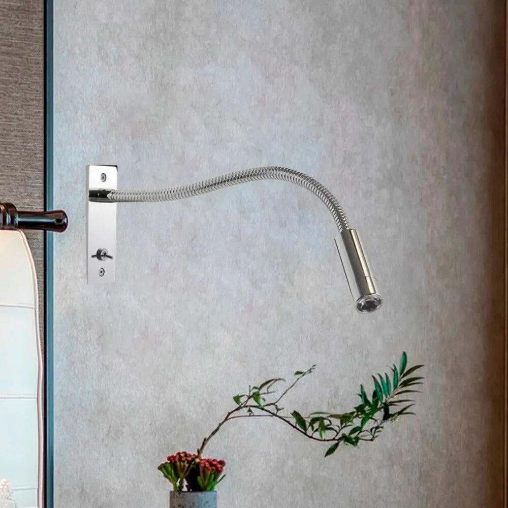 Elegant minimalist wall lamp, adjustable LED spotlight, perfect modern bedroom reading light.